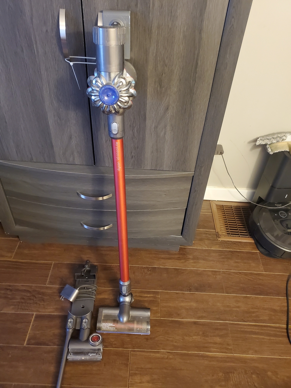 Dyson Stick Vacuum Cleaner in Red and Silver